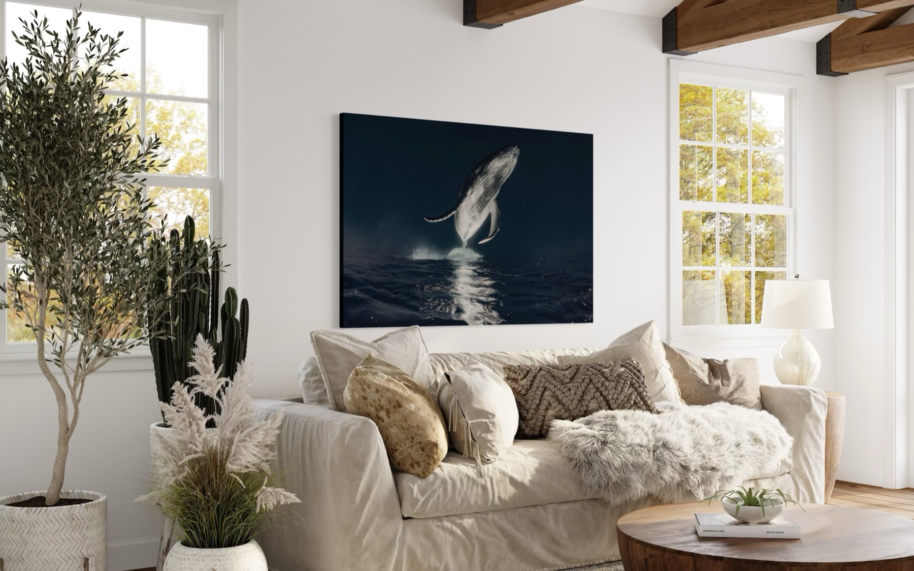 A McKane whale piece on acrylic, shown at scale on a living-room wall
